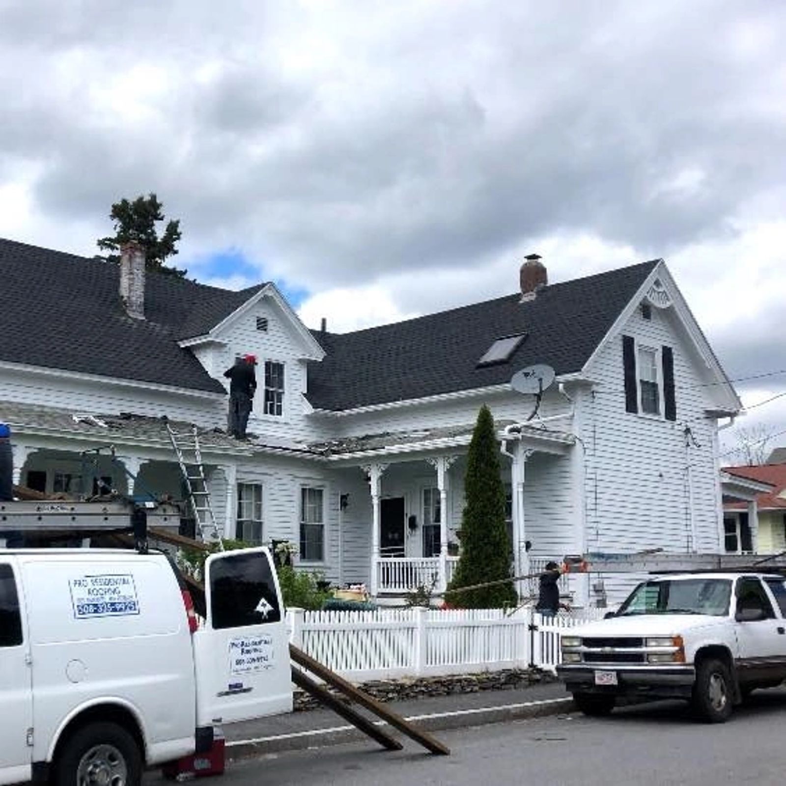 Completed shingle roof on a New England home
